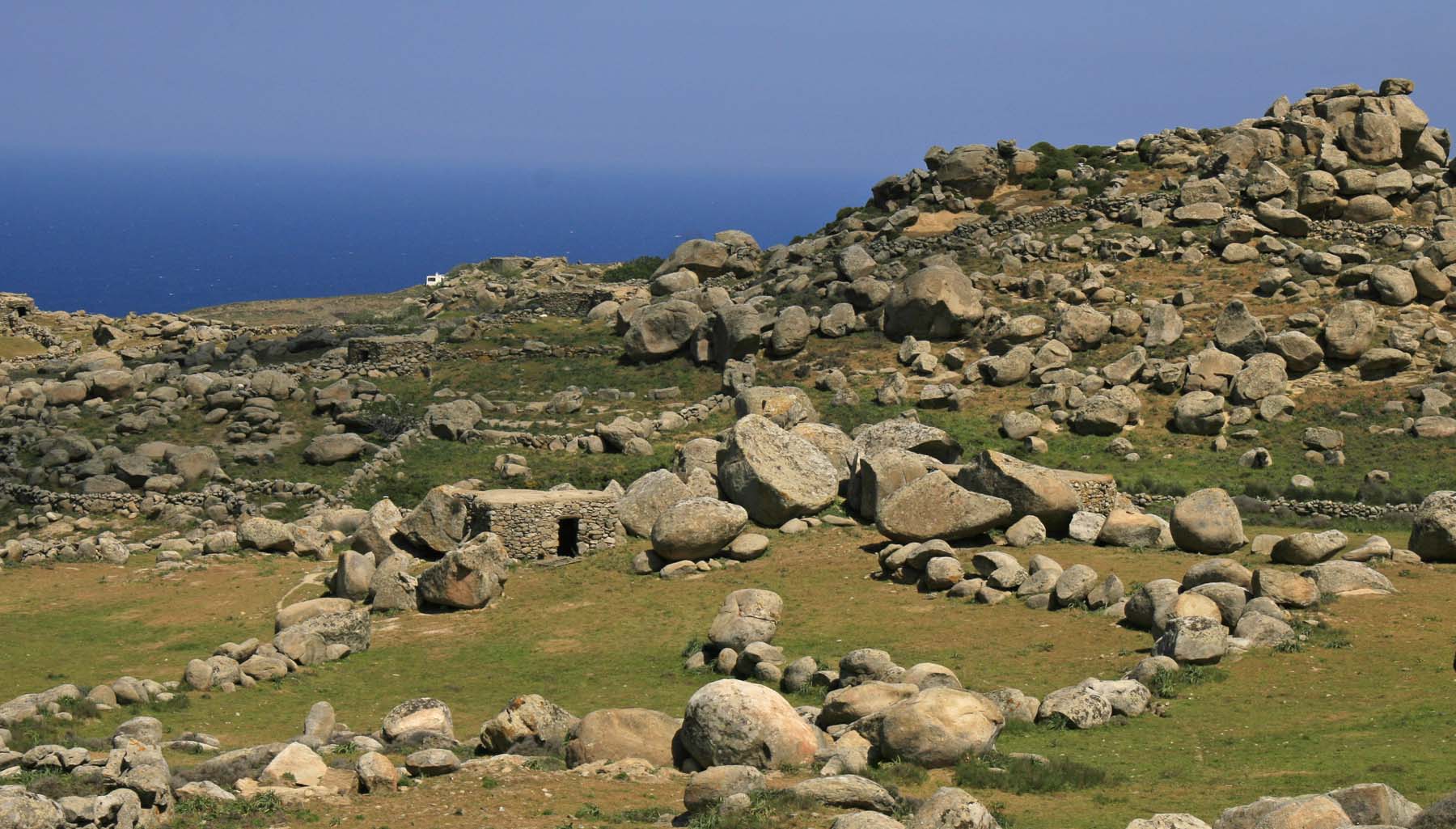Tinos stroggyloi granites Valy Vaimaki
